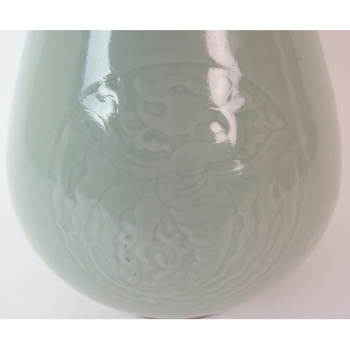 81 - A Chinese celadon archers vase