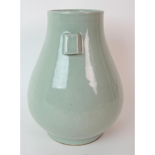 81 - A Chinese celadon archers vase