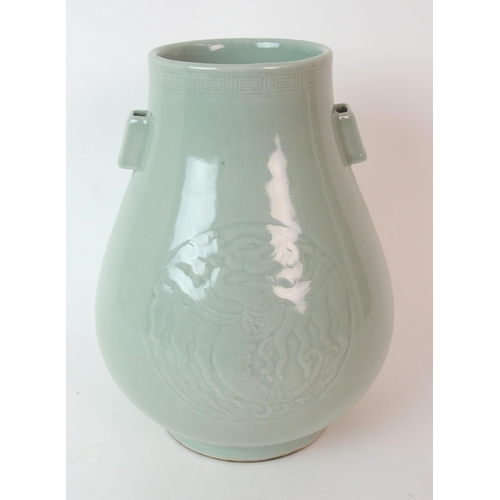 81 - A Chinese celadon archers vase