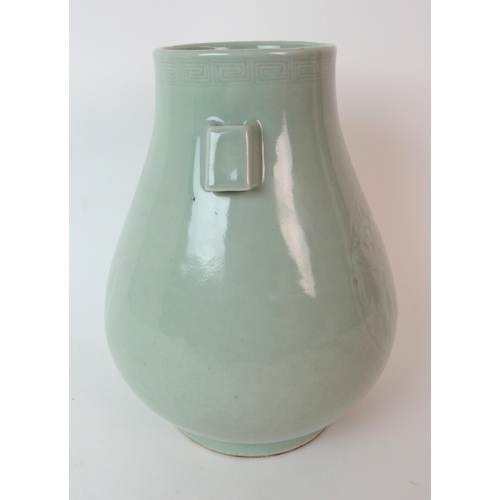 81 - A Chinese celadon archers vase