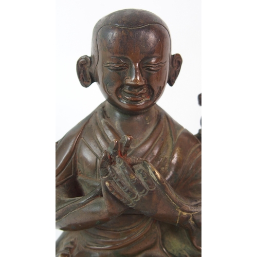 83 - A Chinese bronze model of Buddha