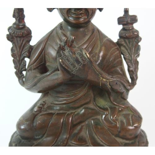 83 - A Chinese bronze model of Buddha