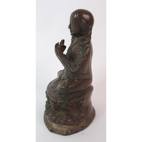 83 - A Chinese bronze model of Buddha