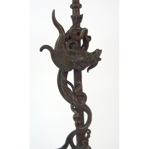 84 - A Chinese pierced bronze pricket candlestick