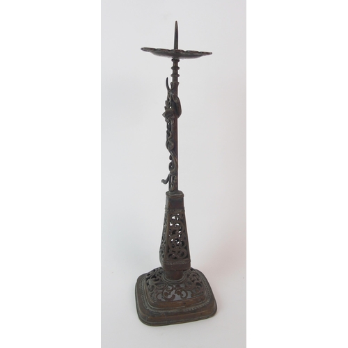 84 - A Chinese pierced bronze pricket candlestick