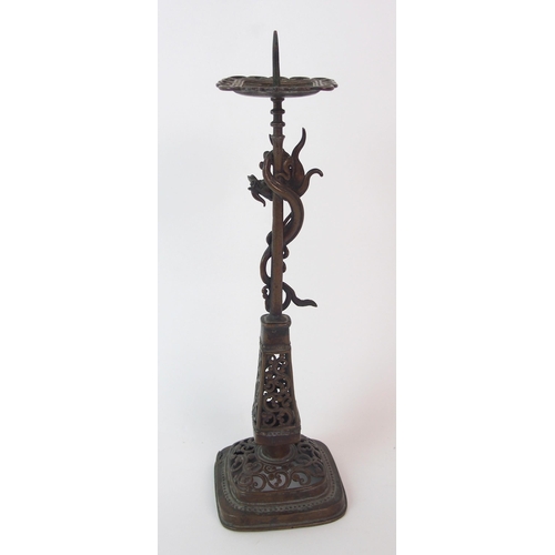 84 - A Chinese pierced bronze pricket candlestick