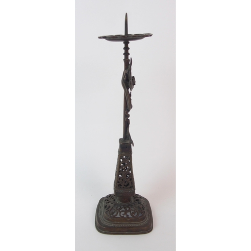 84 - A Chinese pierced bronze pricket candlestick