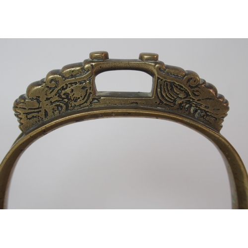 86 - A pair of Chinese brass horse stirrups