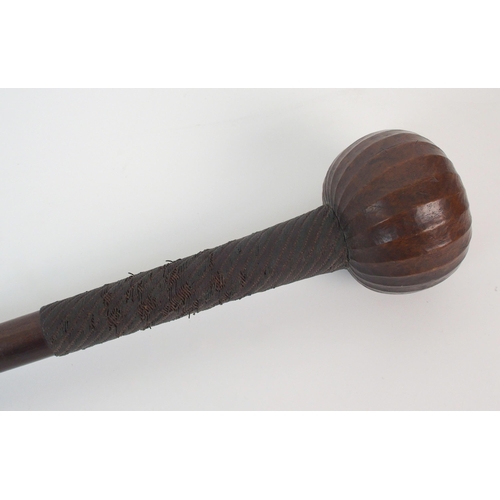 92 - An African hardwood and metal bound knobkerrie