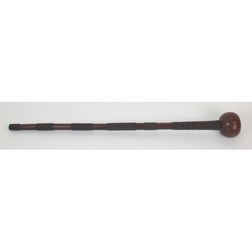 92 - An African hardwood and metal bound knobkerrie