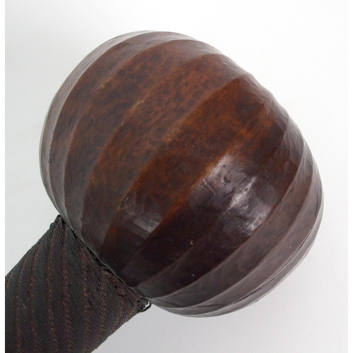 92 - An African hardwood and metal bound knobkerrie