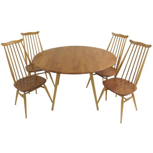 1002 - An Ercol oval drop-leaf table