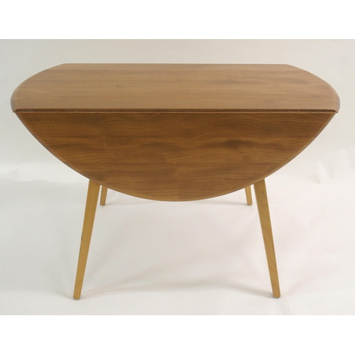 1002 - An Ercol oval drop-leaf table