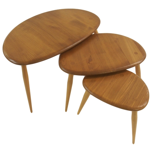 1004 - An Ercol nest of three pebble tables