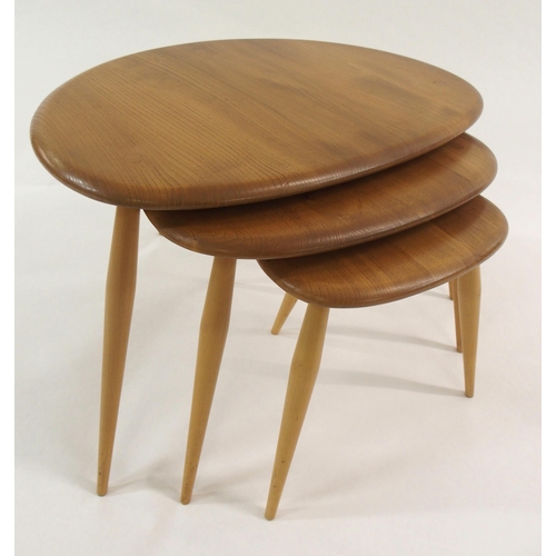 1004 - An Ercol nest of three pebble tables