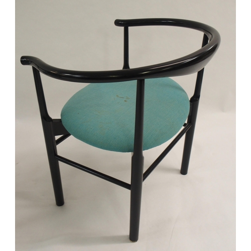 1007 - A pair of black Danish armchairs