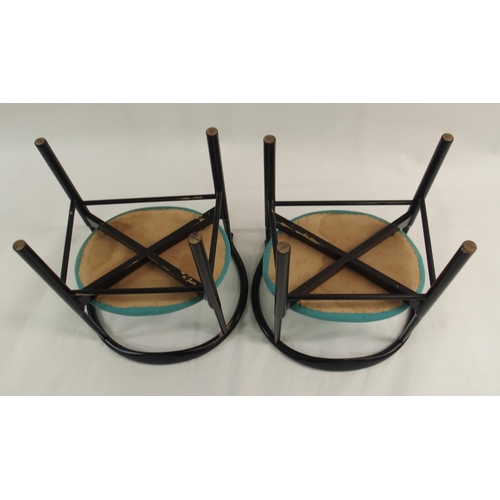 1007 - A pair of black Danish armchairs