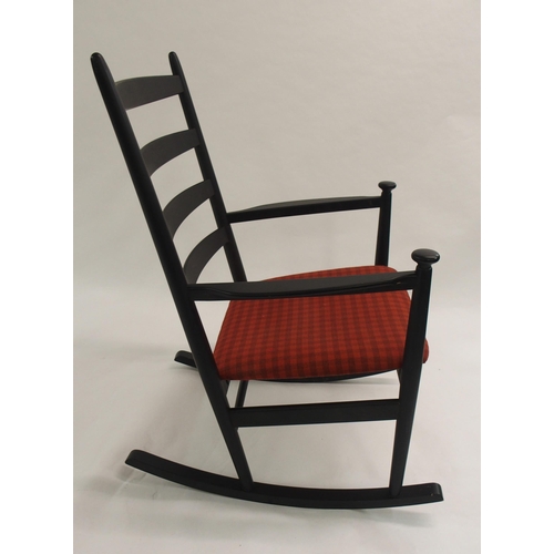 1009 - A Danish style black ladderback rocking chair