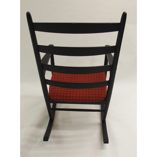 1009 - A Danish style black ladderback rocking chair