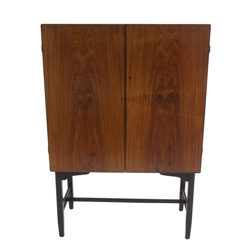 1010 - A 1960's rosewood veneer two door cocktail cabinet