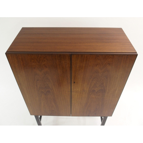 1010 - A 1960's rosewood veneer two door cocktail cabinet