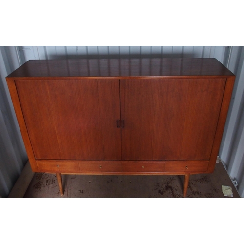 1011 - A Tambour front teak sideboard