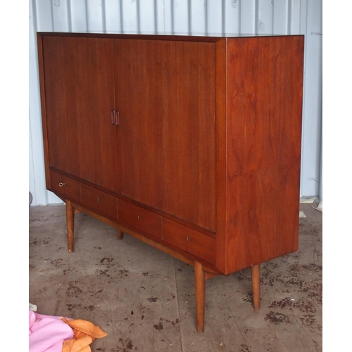 1011 - A Tambour front teak sideboard