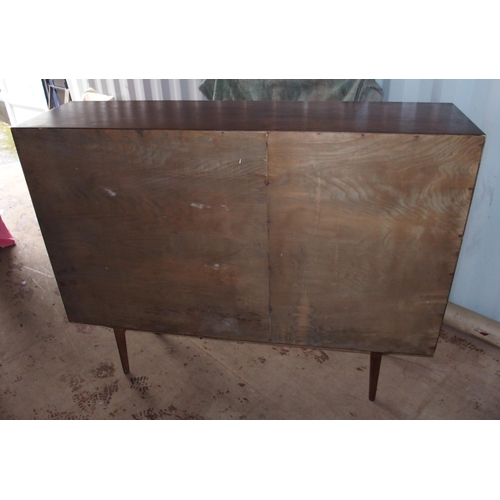 1011 - A Tambour front teak sideboard