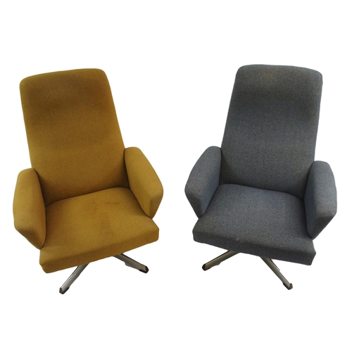 1017 - Two mid-20th Century upholstered swivel chairs