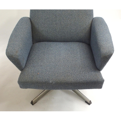 1017 - Two mid-20th Century upholstered swivel chairs