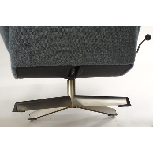 1017 - Two mid-20th Century upholstered swivel chairs