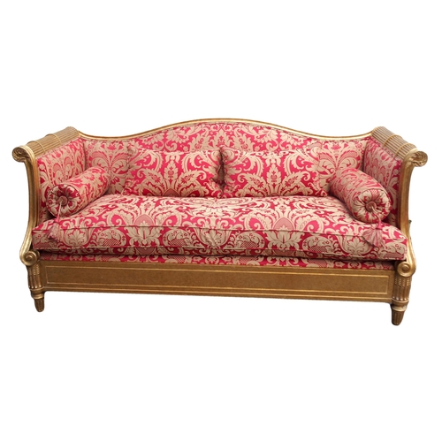 1019 - A modern gilt framed Reims sofa