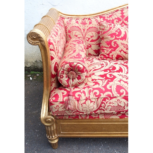 1019 - A modern gilt framed Reims sofa