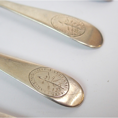 253 - A set of five Irish silver cake forks