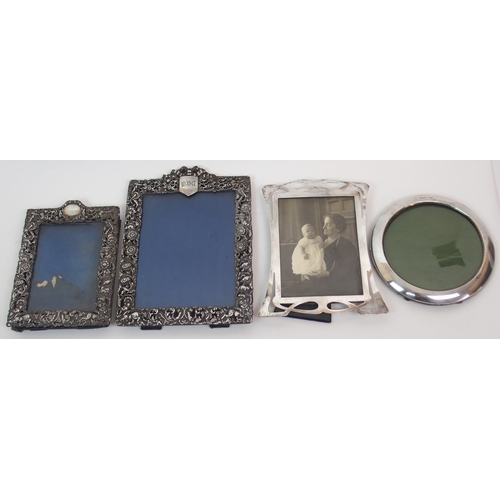 263 - A Victorian silver photograph frame