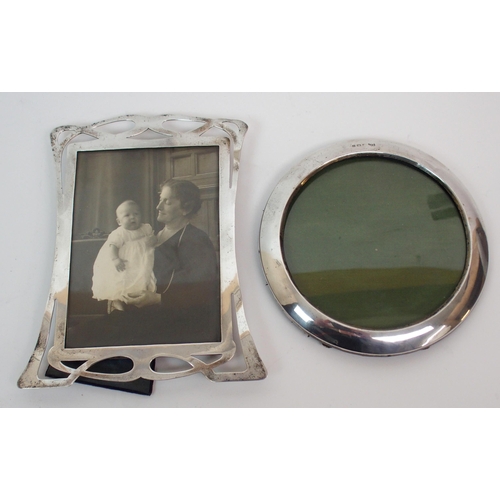 263 - A Victorian silver photograph frame