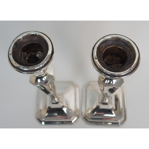 272 - A pair of silver candlesticks