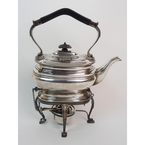 273 - A silver kettle on stand