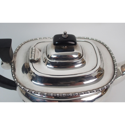 274 - A three piece silver tea service