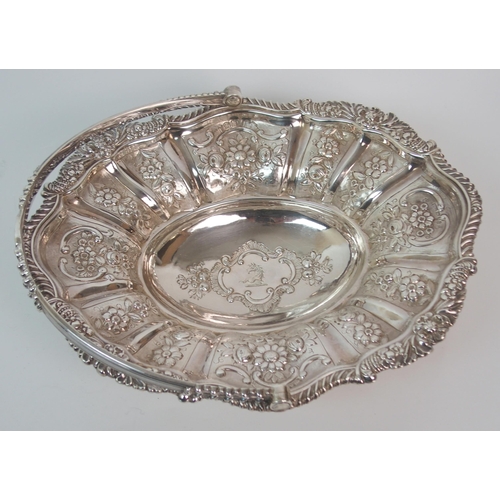 278 - A George IV silver swing handled basket