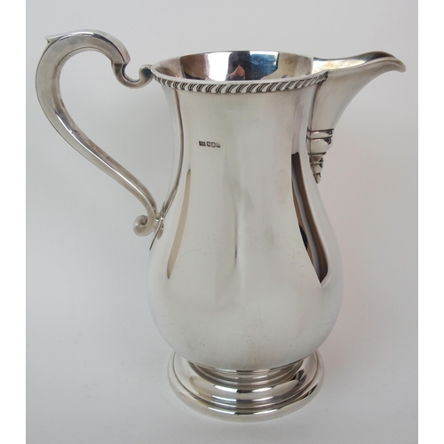 280 - A silver water or ale jug