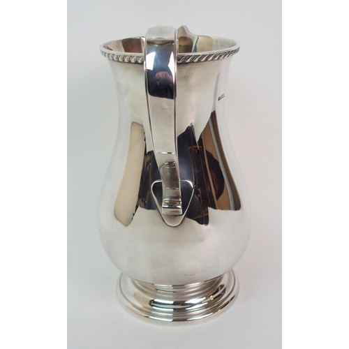 280 - A silver water or ale jug