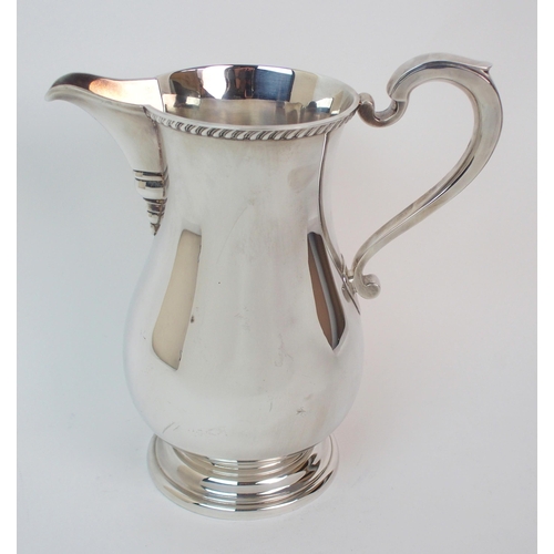 280 - A silver water or ale jug