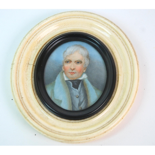 379 - A painted oval miniature of a gentleman