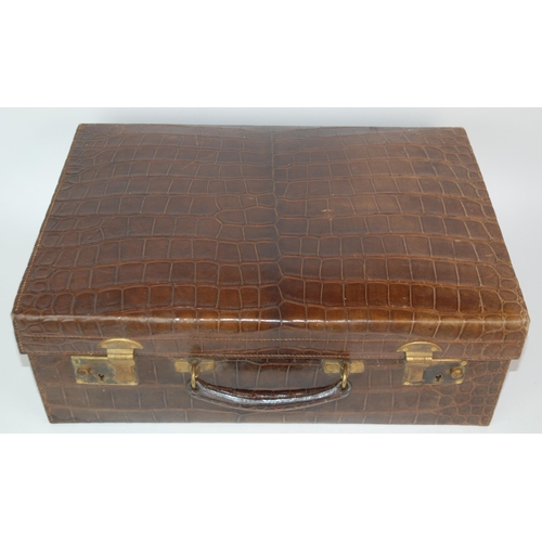 383 - Two brown leather animal skin suitcases