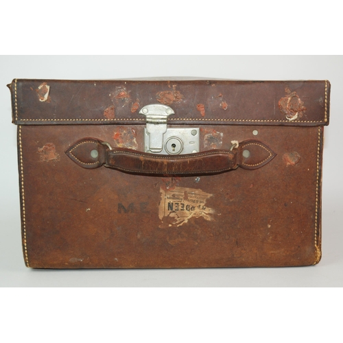 384 - A brown leather case