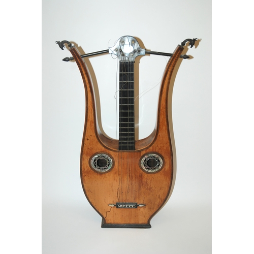 388 - An early Lyre guitar with mother of pearl inlay