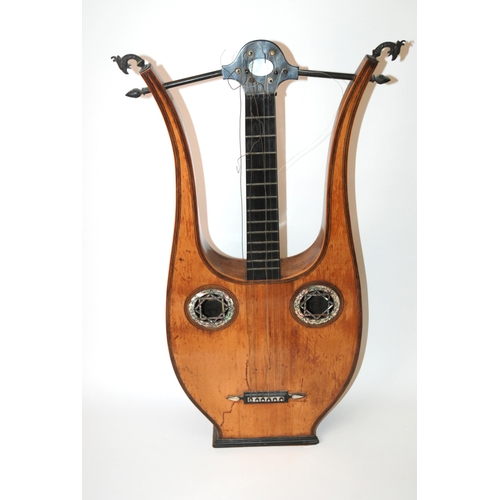 388 - An early Lyre guitar with mother of pearl inlay