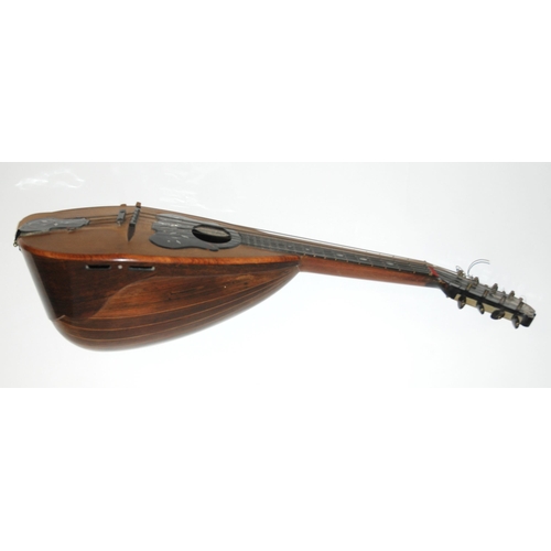 392 - A late 19th Century domed back mandolin