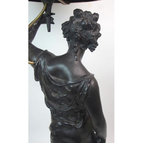 553 - A spelter figural lamp